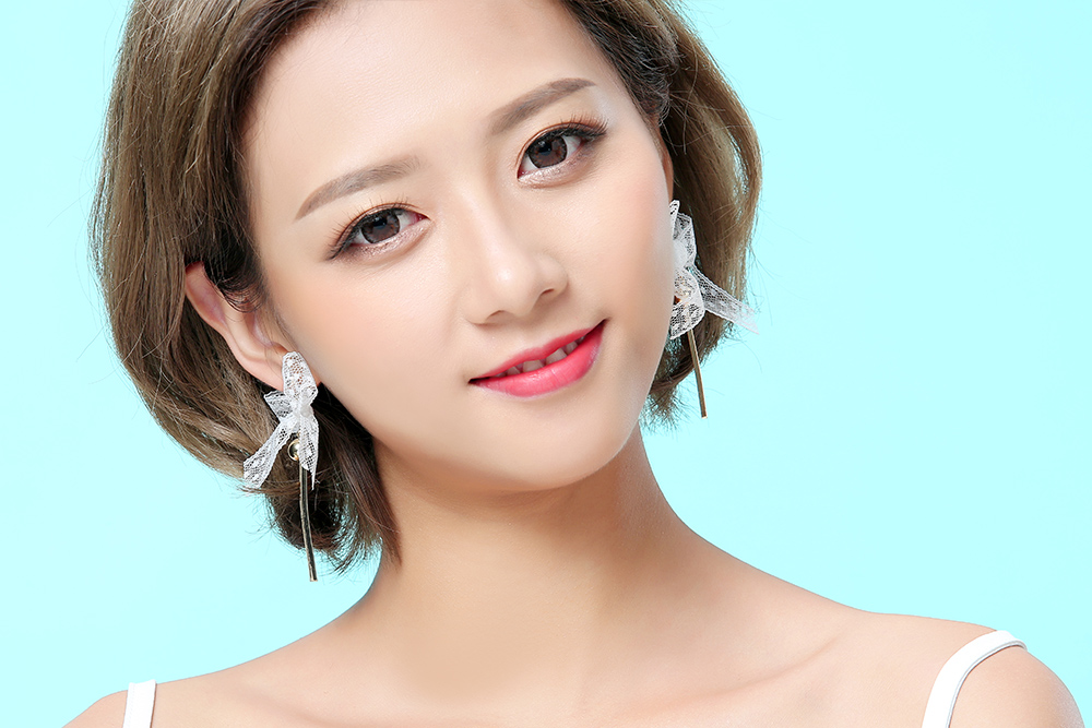 【2件折60元】气质蕾丝缎带蝴蝶结黏式耳环